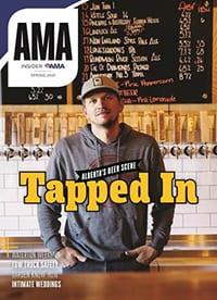 Cover of AMA Insider Magazine spring 2021 with man standing behind the bar at a brewery.