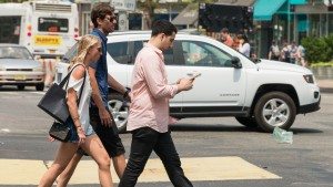 distracted pedestrian smartphone walking pokemon go