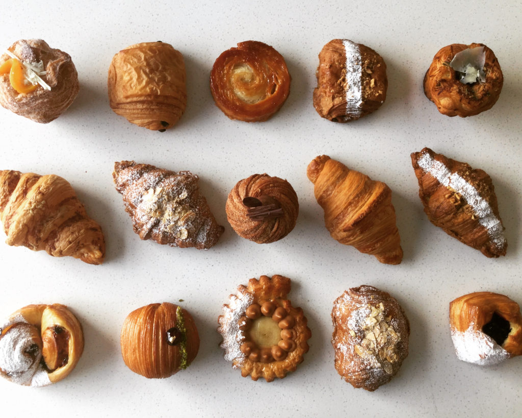 three rows of croissants and other sweet pastries from La Boule